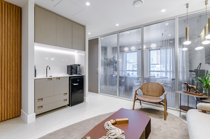 Lounge e recepção da Riccio Imóveis